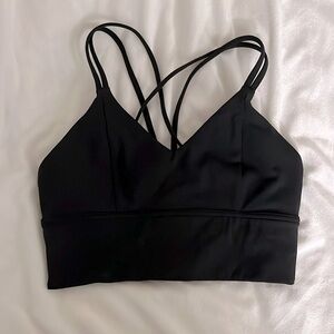 Possibly lululemon? Longline sports bra with detailing size 4